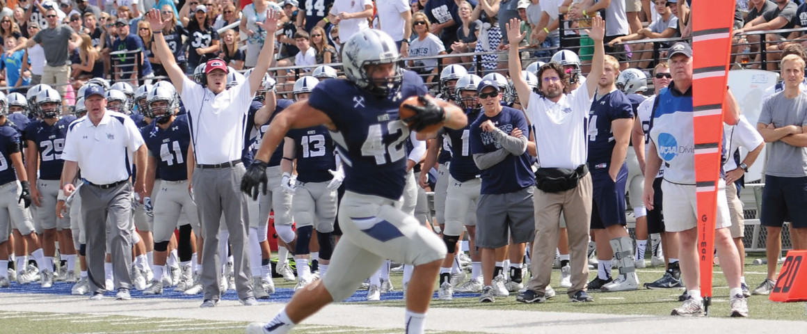 Junior Sam Seeton sprints towards the endzone after catching a pass from Junior Justin Dvorak in the first quarter against South Dakota School of Mines. This was just one of eight touchdown passes thrown by Dvorak in the game.